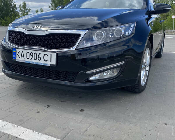 Черный Киа Оптима, объемом двигателя 2 л и пробегом 164 тыс. км за 10500 $, фото 3 на Automoto.ua