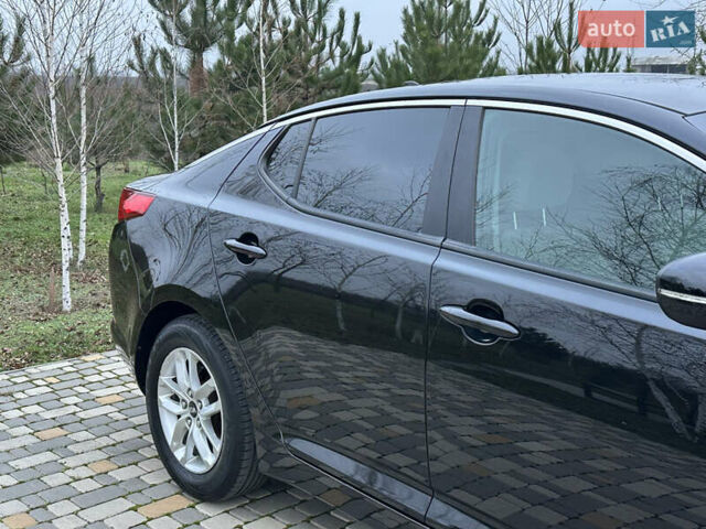 Черный Киа Оптима, объемом двигателя 2.36 л и пробегом 201 тыс. км за 7600 $, фото 22 на Automoto.ua