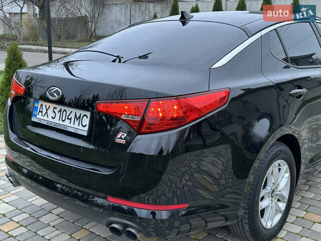 Черный Киа Оптима, объемом двигателя 2.36 л и пробегом 201 тыс. км за 7600 $, фото 12 на Automoto.ua