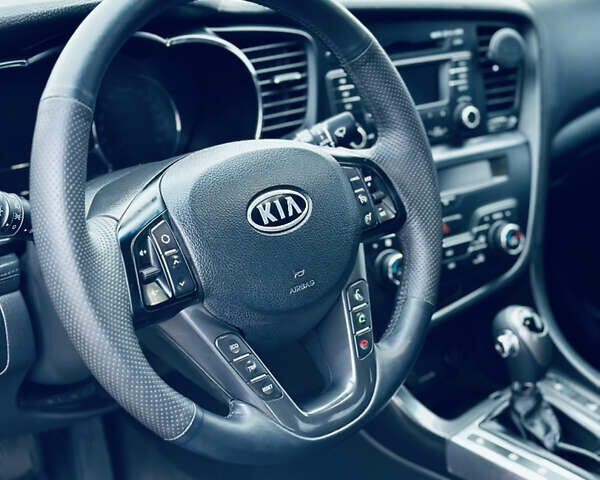 Черный Киа Оптима, объемом двигателя 2.36 л и пробегом 210 тыс. км за 9900 $, фото 12 на Automoto.ua