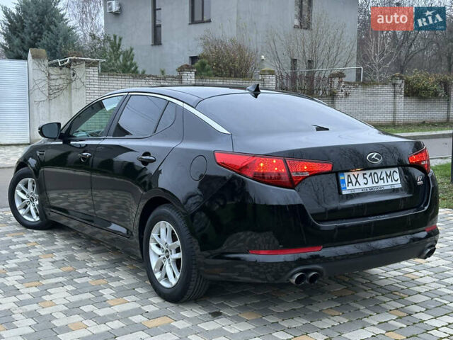 Черный Киа Оптима, объемом двигателя 2.36 л и пробегом 201 тыс. км за 7600 $, фото 14 на Automoto.ua