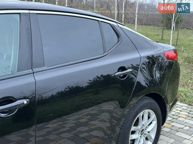 Черный Киа Оптима, объемом двигателя 2.36 л и пробегом 201 тыс. км за 7600 $, фото 18 на Automoto.ua