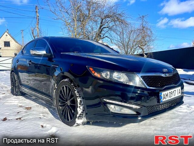 Черный Киа Оптима, объемом двигателя 2 л и пробегом 145 тыс. км за 10500 $, фото 1 на Automoto.ua