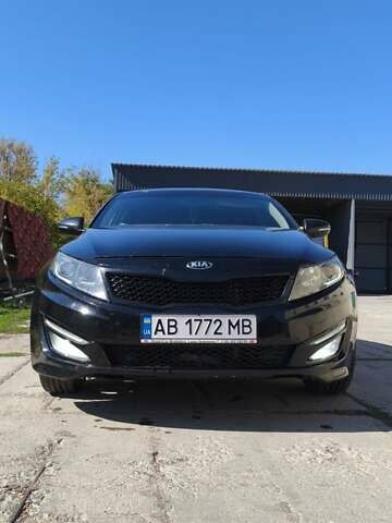 Черный Киа Оптима, объемом двигателя 1.69 л и пробегом 306 тыс. км за 8950 $, фото 8 на Automoto.ua