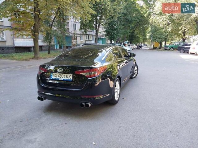 Чорний Кіа Оптіма, об'ємом двигуна 2 л та пробігом 155 тис. км за 8500 $, фото 6 на Automoto.ua