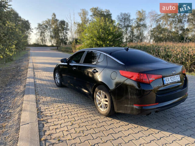 Чорний Кіа Оптіма, об'ємом двигуна 2.36 л та пробігом 191 тис. км за 7500 $, фото 6 на Automoto.ua
