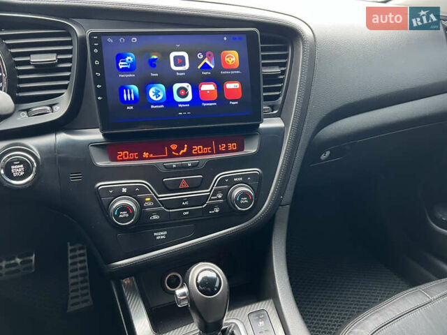 Черный Киа Оптима, объемом двигателя 2 л и пробегом 185 тыс. км за 10200 $, фото 8 на Automoto.ua