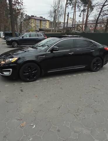 Черный Киа Оптима, объемом двигателя 2.36 л и пробегом 136 тыс. км за 10400 $, фото 8 на Automoto.ua