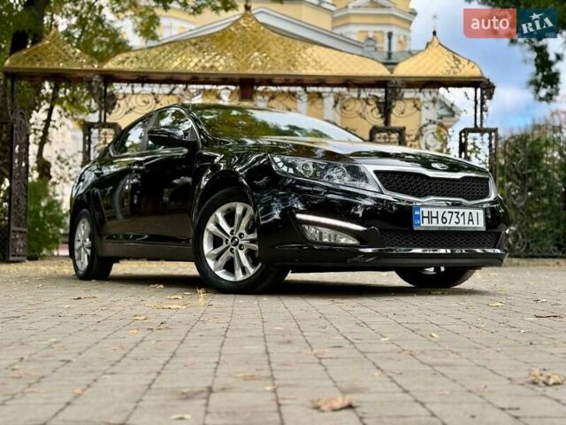Черный Киа Оптима, объемом двигателя 2 л и пробегом 183 тыс. км за 9800 $, фото 14 на Automoto.ua