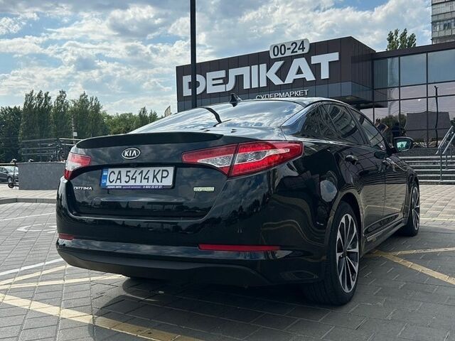 Чорний Кіа Оптіма, об'ємом двигуна 2.4 л та пробігом 225 тис. км за 9200 $, фото 4 на Automoto.ua