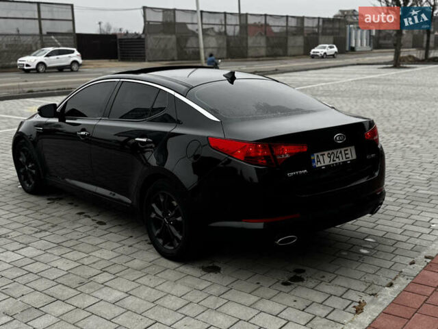 Чорний Кіа Оптіма, об'ємом двигуна 2.36 л та пробігом 206 тис. км за 6850 $, фото 23 на Automoto.ua