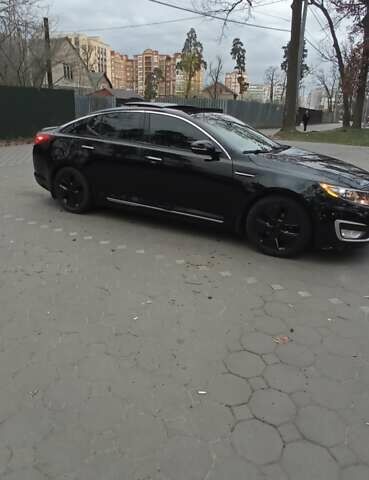 Черный Киа Оптима, объемом двигателя 2.36 л и пробегом 136 тыс. км за 10400 $, фото 4 на Automoto.ua