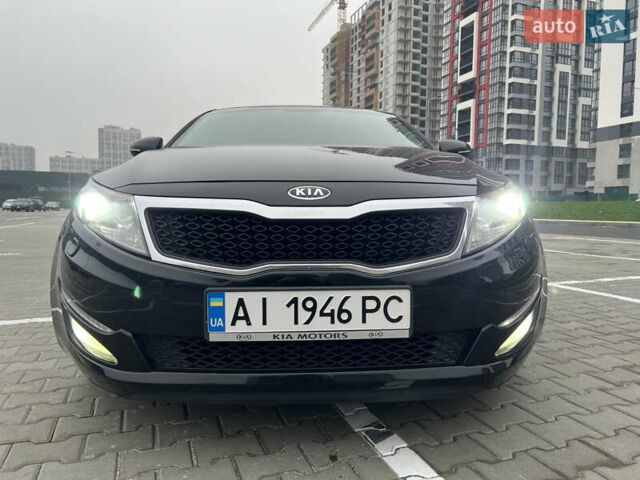 Черный Киа Оптима, объемом двигателя 2 л и пробегом 185 тыс. км за 10200 $, фото 4 на Automoto.ua