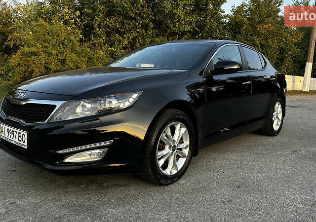 Чорний Кіа Оптіма, об'ємом двигуна 2 л та пробігом 230 тис. км за 7950 $, фото 4 на Automoto.ua
