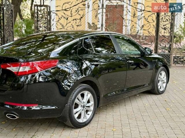 Черный Киа Оптима, объемом двигателя 2 л и пробегом 183 тыс. км за 9800 $, фото 26 на Automoto.ua