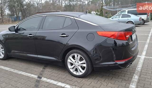 Черный Киа Оптима, объемом двигателя 2.36 л и пробегом 225 тыс. км за 8800 $, фото 2 на Automoto.ua