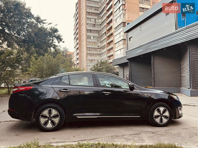 Черный Киа Оптима, объемом двигателя 2.36 л и пробегом 200 тыс. км за 9000 $, фото 5 на Automoto.ua