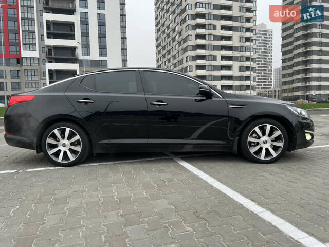 Черный Киа Оптима, объемом двигателя 2 л и пробегом 185 тыс. км за 10200 $, фото 1 на Automoto.ua