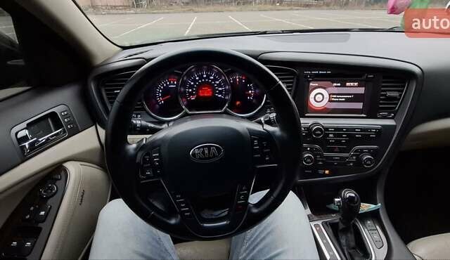 Черный Киа Оптима, объемом двигателя 2.36 л и пробегом 225 тыс. км за 8800 $, фото 5 на Automoto.ua