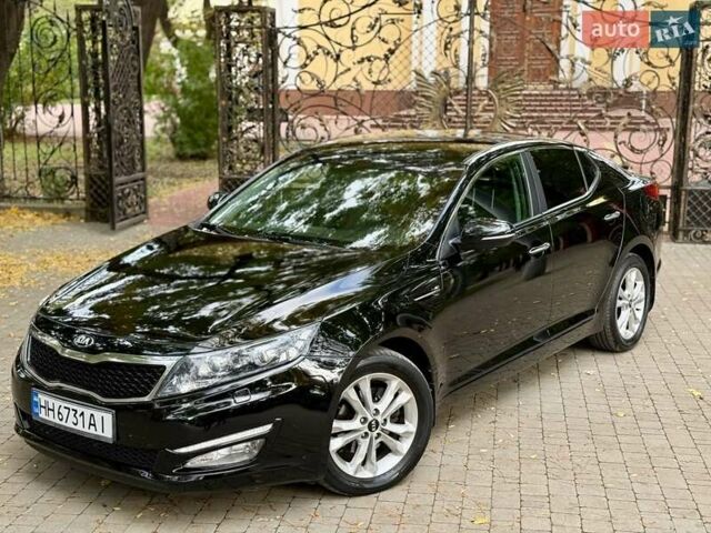 Черный Киа Оптима, объемом двигателя 2 л и пробегом 183 тыс. км за 9800 $, фото 3 на Automoto.ua