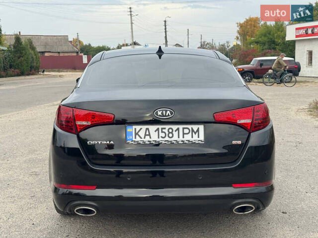 Черный Киа Оптима, объемом двигателя 2.4 л и пробегом 178 тыс. км за 8750 $, фото 12 на Automoto.ua