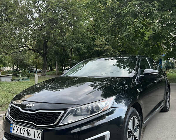 Черный Киа Оптима, объемом двигателя 2.36 л и пробегом 200 тыс. км за 9000 $, фото 1 на Automoto.ua