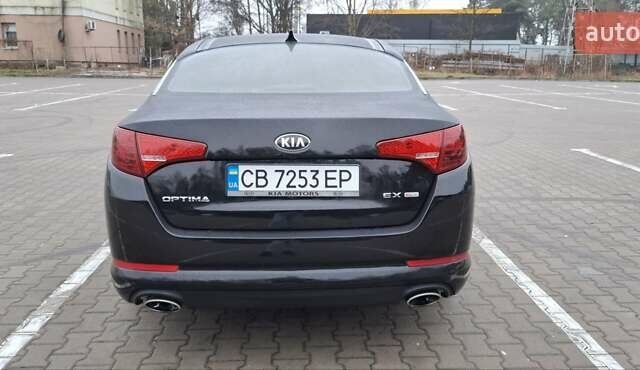 Черный Киа Оптима, объемом двигателя 2.36 л и пробегом 225 тыс. км за 8800 $, фото 1 на Automoto.ua