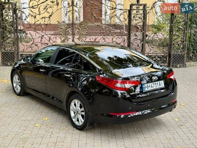 Черный Киа Оптима, объемом двигателя 2 л и пробегом 183 тыс. км за 9800 $, фото 23 на Automoto.ua