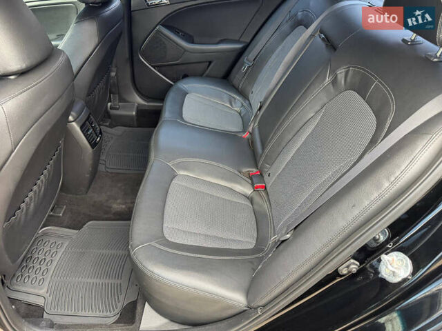 Черный Киа Оптима, объемом двигателя 2.36 л и пробегом 163 тыс. км за 8500 $, фото 14 на Automoto.ua