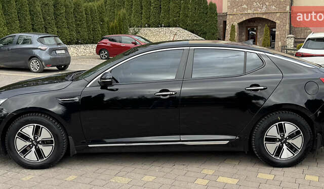 Черный Киа Оптима, объемом двигателя 2.36 л и пробегом 163 тыс. км за 8500 $, фото 6 на Automoto.ua