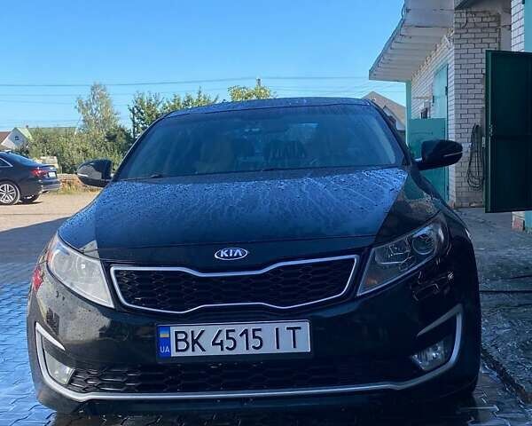 Черный Киа Оптима, объемом двигателя 2.36 л и пробегом 260 тыс. км за 8500 $, фото 1 на Automoto.ua