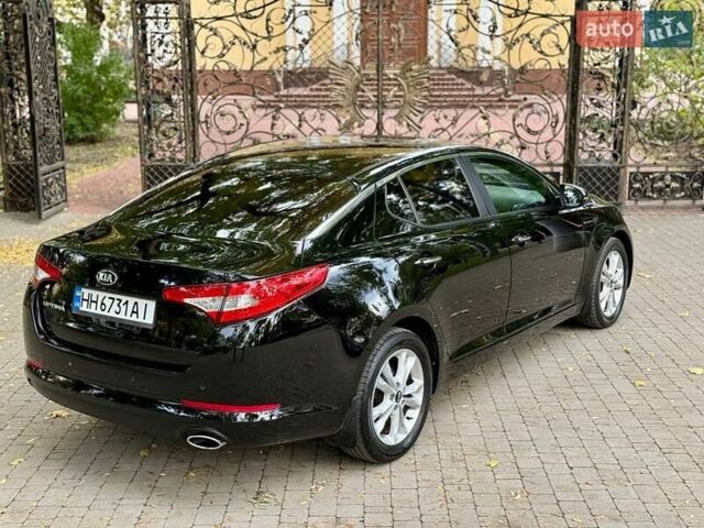 Черный Киа Оптима, объемом двигателя 2 л и пробегом 183 тыс. км за 9800 $, фото 20 на Automoto.ua