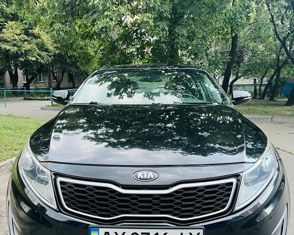 Черный Киа Оптима, объемом двигателя 2.36 л и пробегом 200 тыс. км за 9000 $, фото 2 на Automoto.ua