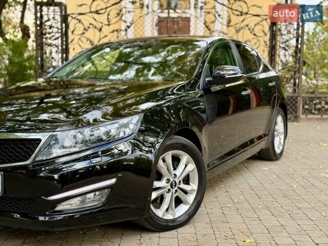 Черный Киа Оптима, объемом двигателя 2 л и пробегом 183 тыс. км за 9800 $, фото 2 на Automoto.ua