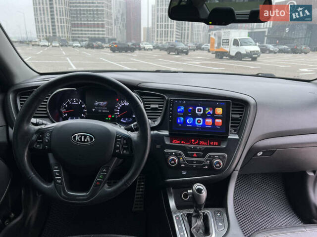 Черный Киа Оптима, объемом двигателя 2 л и пробегом 185 тыс. км за 10200 $, фото 7 на Automoto.ua