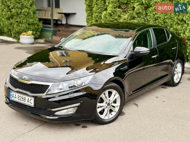 Черный Киа Оптима, объемом двигателя 2 л и пробегом 177 тыс. км за 9700 $, фото 16 на Automoto.ua