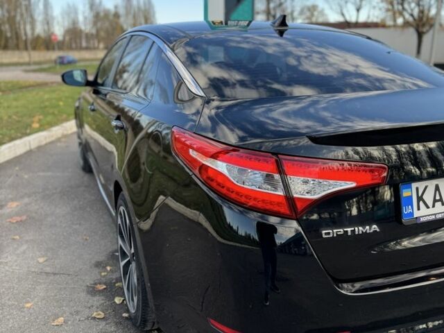 Черный Киа Оптима, объемом двигателя 2.4 л и пробегом 210 тыс. км за 262 $, фото 1 на Automoto.ua