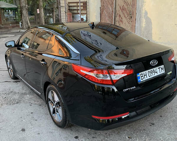 Чорний Кіа Оптіма, об'ємом двигуна 2.4 л та пробігом 289 тис. км за 11000 $, фото 3 на Automoto.ua
