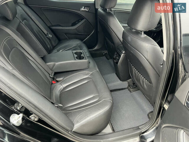 Черный Киа Оптима, объемом двигателя 2 л и пробегом 185 тыс. км за 10200 $, фото 14 на Automoto.ua