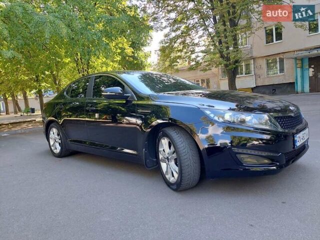 Чорний Кіа Оптіма, об'ємом двигуна 2 л та пробігом 155 тис. км за 8500 $, фото 9 на Automoto.ua