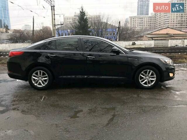 Чорний Кіа Оптіма, об'ємом двигуна 2.4 л та пробігом 129 тис. км за 6999 $, фото 5 на Automoto.ua