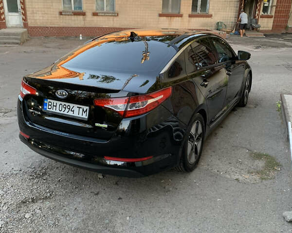 Чорний Кіа Оптіма, об'ємом двигуна 2.4 л та пробігом 289 тис. км за 11000 $, фото 4 на Automoto.ua