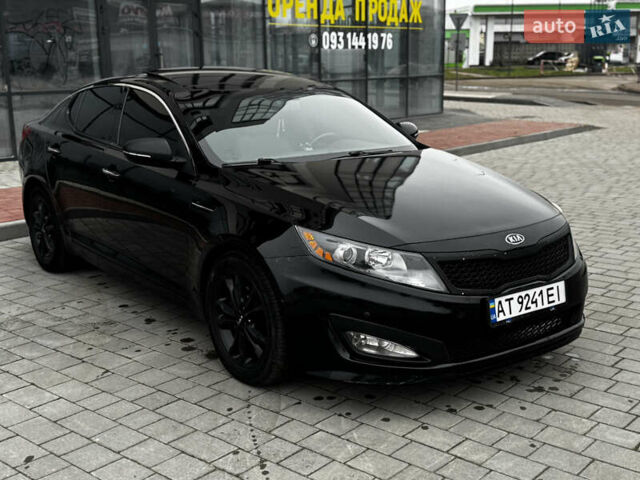 Чорний Кіа Оптіма, об'ємом двигуна 2.36 л та пробігом 206 тис. км за 6850 $, фото 7 на Automoto.ua
