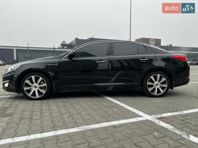 Черный Киа Оптима, объемом двигателя 2 л и пробегом 185 тыс. км за 10200 $, фото 3 на Automoto.ua
