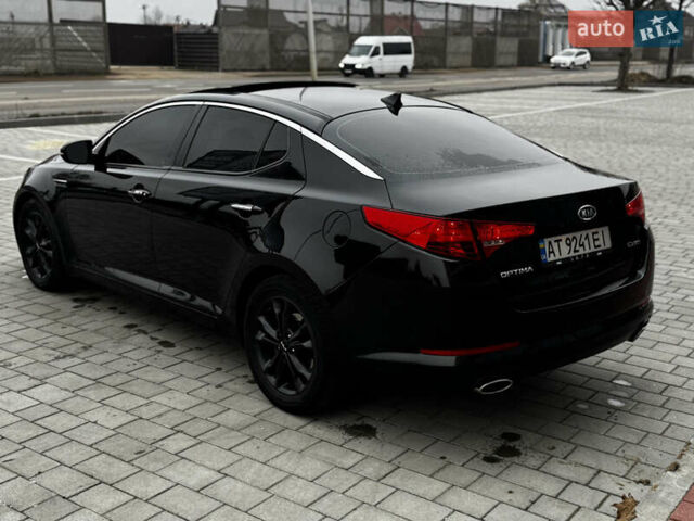 Чорний Кіа Оптіма, об'ємом двигуна 2.36 л та пробігом 206 тис. км за 6850 $, фото 22 на Automoto.ua