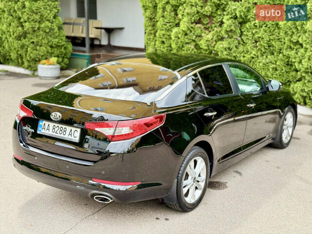 Черный Киа Оптима, объемом двигателя 2 л и пробегом 177 тыс. км за 9700 $, фото 5 на Automoto.ua