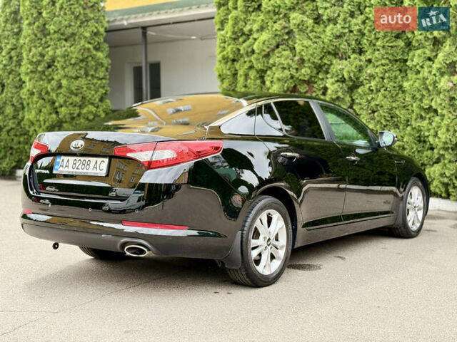 Черный Киа Оптима, объемом двигателя 2 л и пробегом 177 тыс. км за 9700 $, фото 6 на Automoto.ua