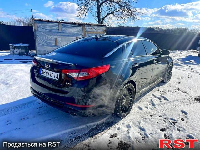 Черный Киа Оптима, объемом двигателя 2 л и пробегом 145 тыс. км за 10500 $, фото 3 на Automoto.ua