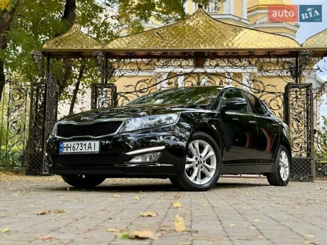 Черный Киа Оптима, объемом двигателя 2 л и пробегом 183 тыс. км за 9800 $, фото 4 на Automoto.ua