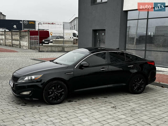 Чорний Кіа Оптіма, об'ємом двигуна 2.36 л та пробігом 206 тис. км за 6850 $, фото 12 на Automoto.ua